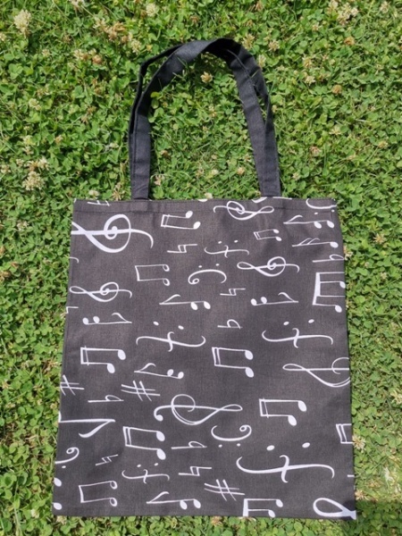 Látková taška s potiskem not - černo/bílá barva